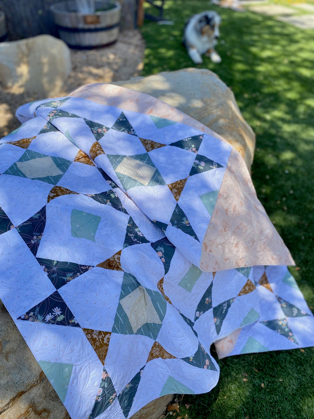 Brightwood Quilt under a shady tree
